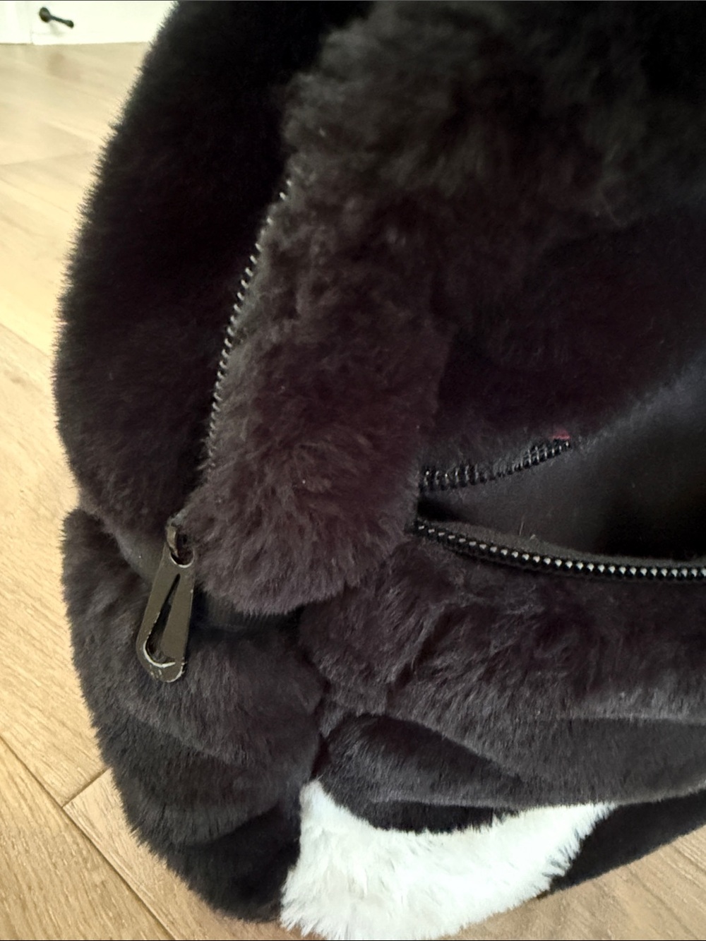 Cozy Black Faux Fur Backpack with White Swoosh - Picture 9 of 9